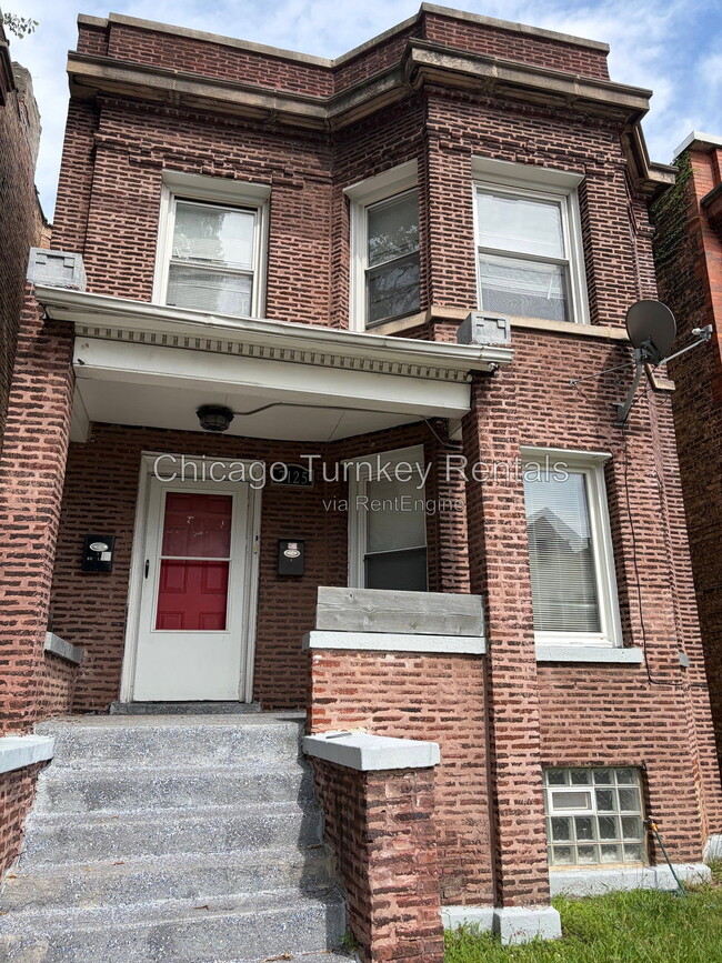 Building Photo - 7125 S Ellis Ave Unit 1