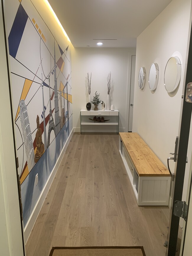 Custom art gallery in entryway with 18X10 full wall Mural - 3923 Cole Ave Unit 202