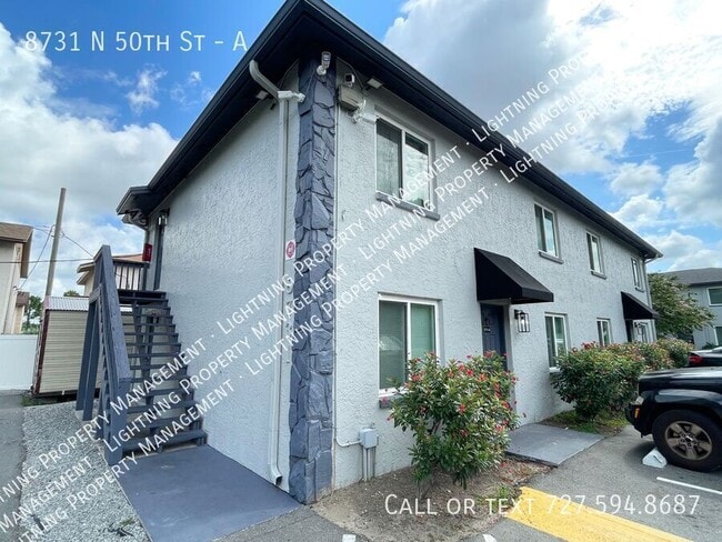 Building Photo - 8731 N 50th St Unit A