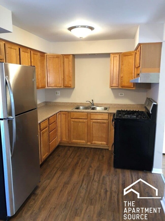 Building Photo - 8549 Grand Ave Unit 3W