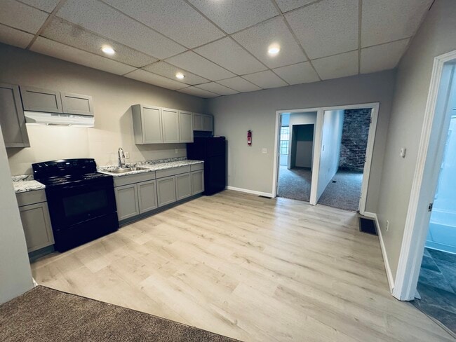 Photo - 351 W 8th St Unit #1 Down