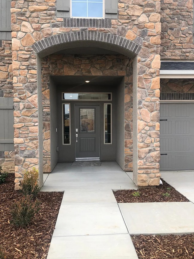 Photo - Beautiful Two-Story Home Featuring Granite Kitchen, Large Island & Spa-Style Primary Suite