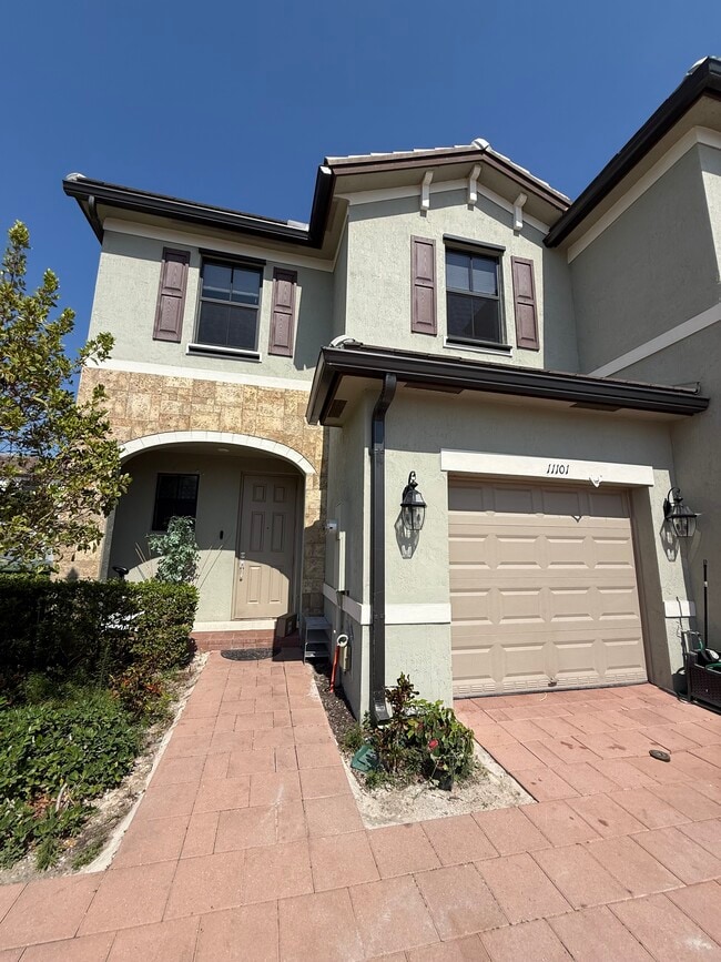 Photo - 11101 W 33rd Ct Townhome