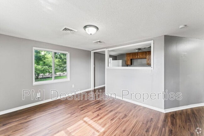 Building Photo - 9408 East 23rd St S Unit Apt 2E