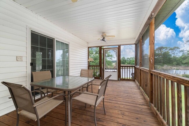 Photo - Waterfront, furnished home with a boat dock