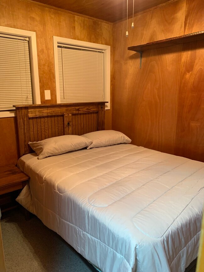 Smaller Bedroom 2. - 5843 N Highway 1 Unit 2.