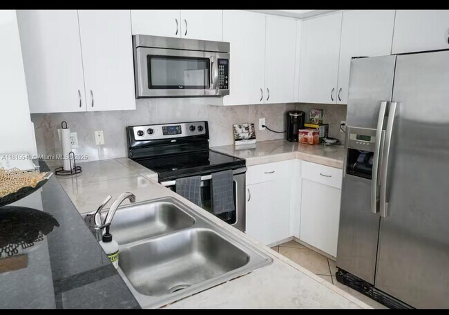Photo - 19601 E Country Club Dr Unit 7-203