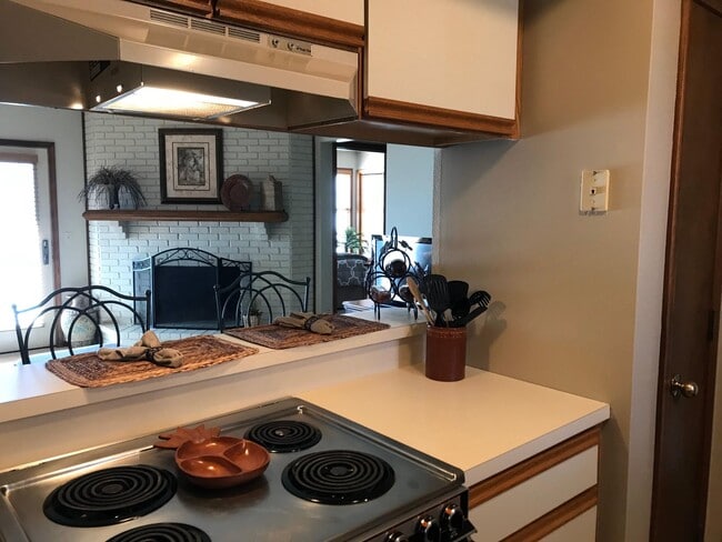 View of living room from kitchen - 5005 Faraon St Unit 103