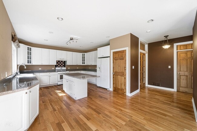 Photo - Executive Style Four Bedroom Home with Finished Basement