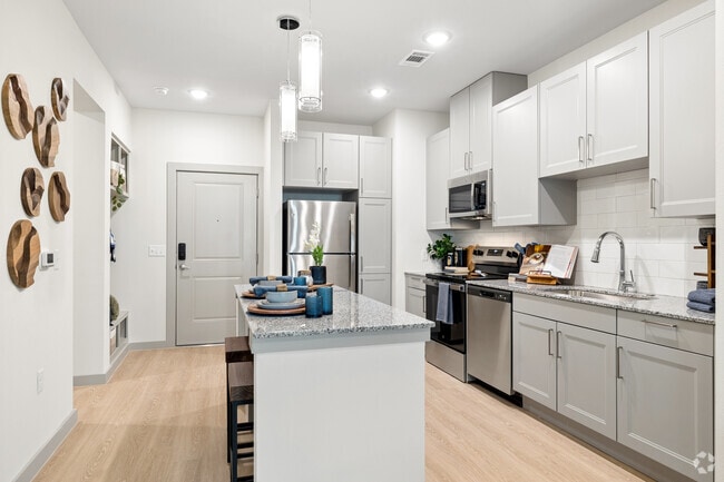 A1 1BR, 1BA - 638SF - Kitchen/Dining Area - Aspire at Greenville