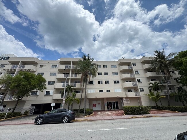 Building Photo - 6801 Harding Ave Unit 201