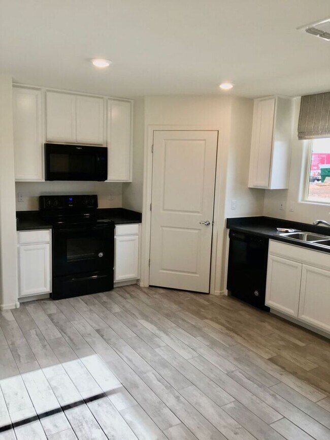 Photo - COMING SOON! New 3BR 2 BA Home w/ 2-Car Garage • Stainless Kitchen • Timer-Irrigated Yard in East...