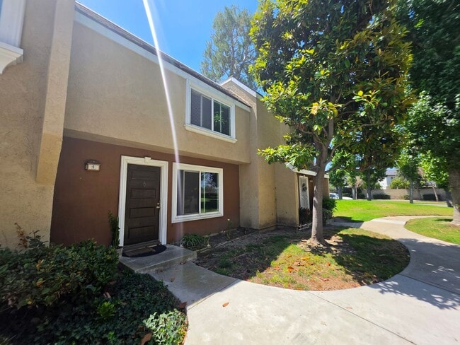 Building Photo - El Camino Real Community: 2 Bedroom 1.5 Bath Attached Townhouse