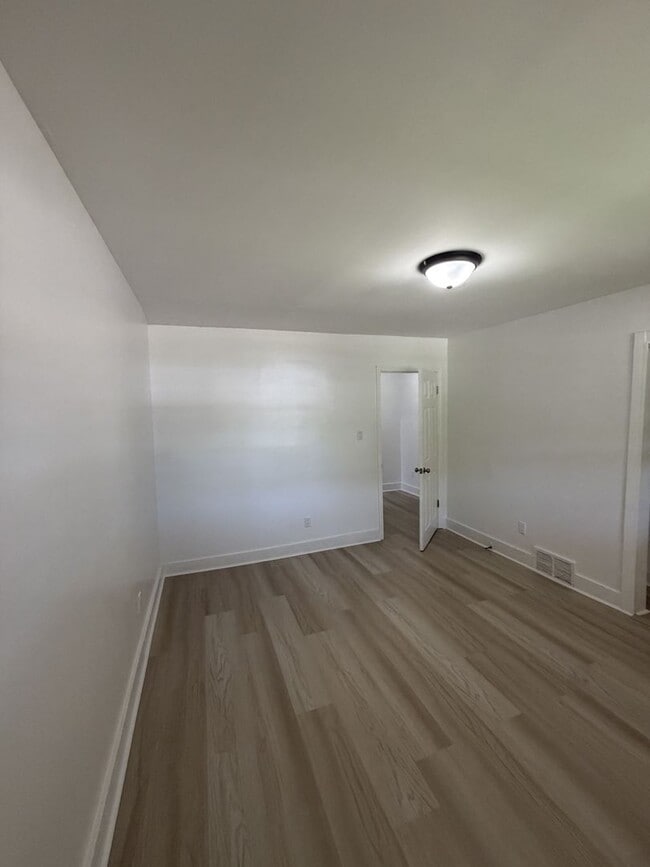 Photo - A spacious and inviting 4-bedroom, 2-bath unfurnished home