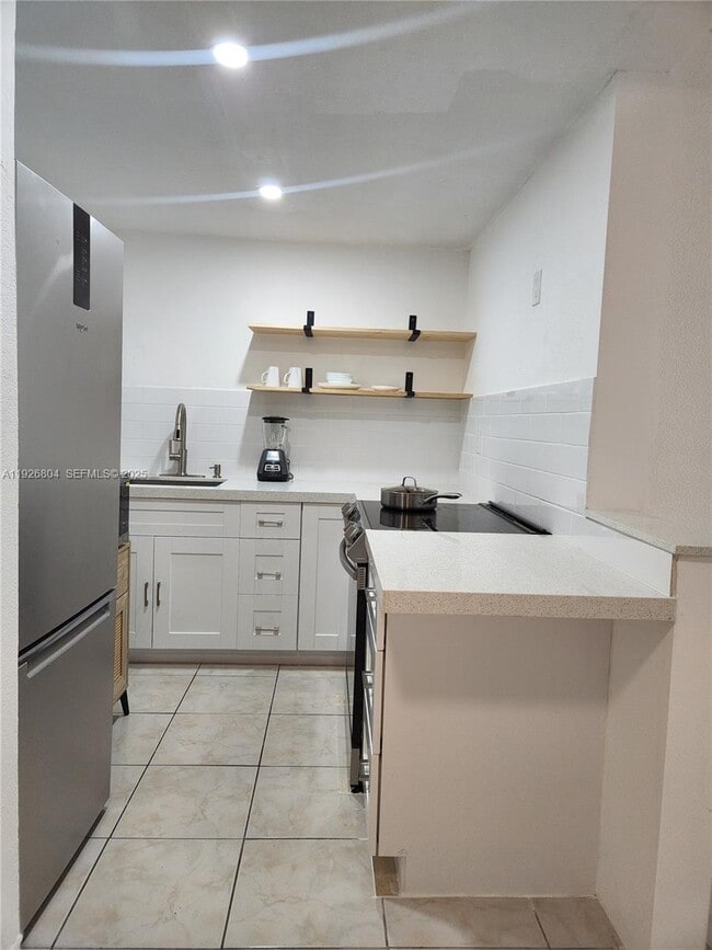 Photo - 666 W 81st St Unit 209