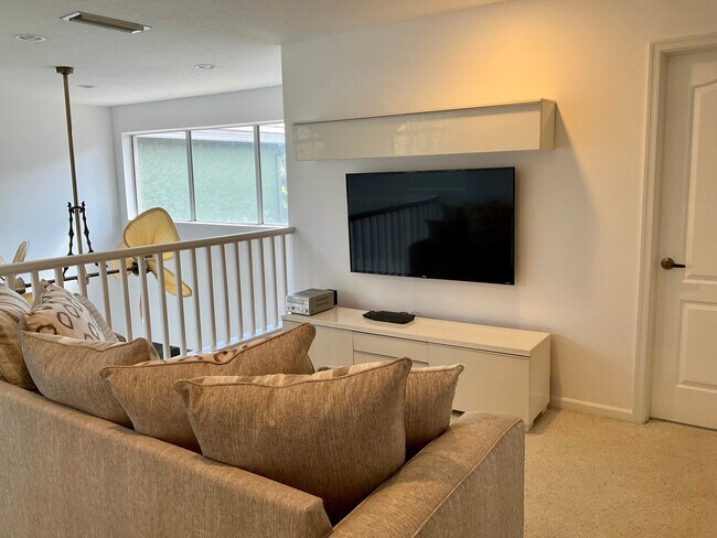 Media room on second level. - 8208 Heritage Club Dr House