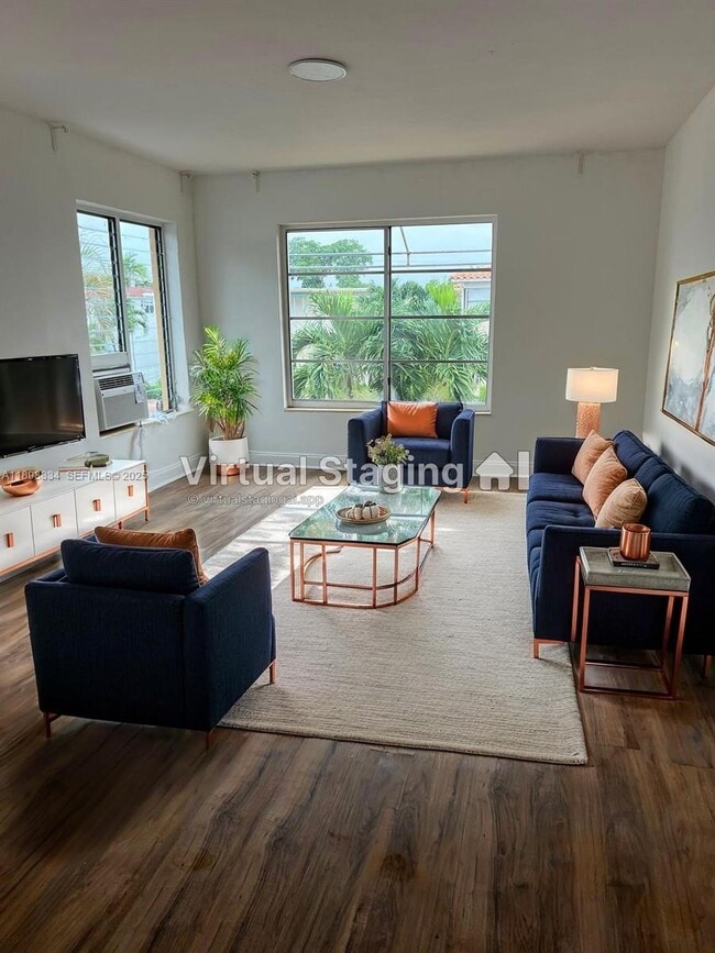 Building Photo - 7333 Byron Ave Unit 7335