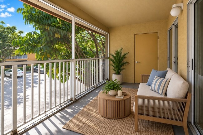Unwind in the serene ambiance of Whaler's Cove, where natural light floods a stylish porch. Enjoy seamless indoor-outdoor living with lush greenery surrounding your space. Elevate your lifestyle today—schedule your visit now!