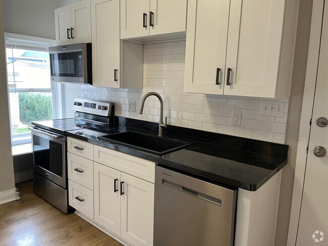 Building Photo - 1364 W 58th St Unit 1 Rental