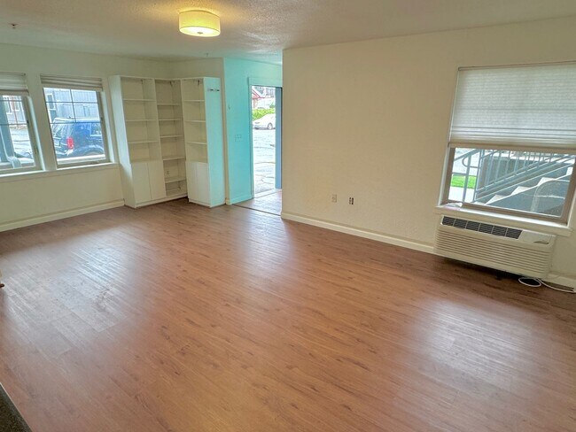 Photo - Gateway Ground Floor Corner Unit Condo with Laminate H/W's, A/C, Assigned Parking, Laundry In-Unit