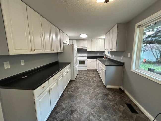 Photo - 4 Bedroom 2 bath Home on Quiet Street with...