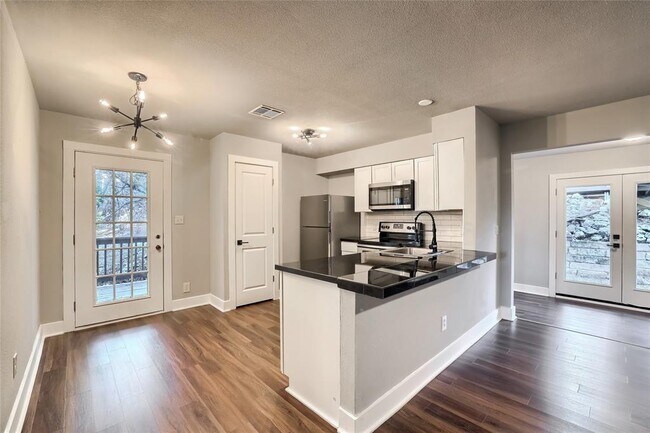 Building Photo - 5909 Lago Vista Way Unit C Rental