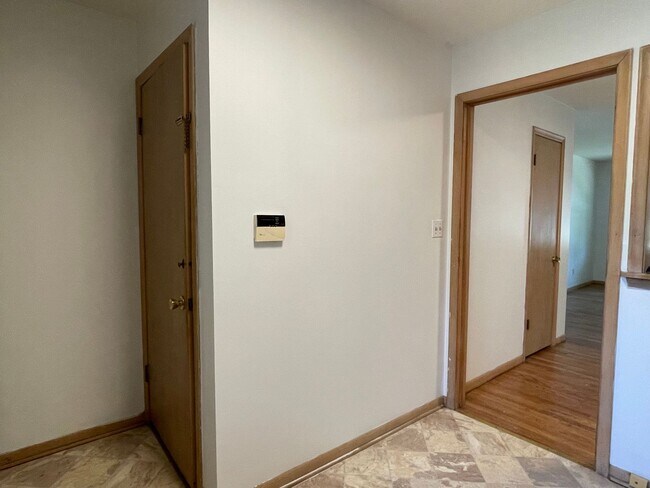 Photo - {731} Convenient Location + Full basement + 2 Car Tandem Garage