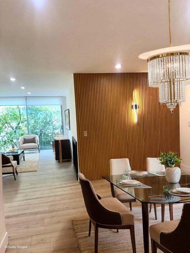 Virtually Staged part of living room and dinning area - 11645 Montana Ave Unit 238