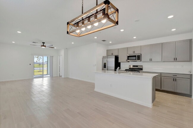 Photo - Luxurious Living: Spacious 5-Bedroom Home with Scenic Views in Port Saint Lucie!