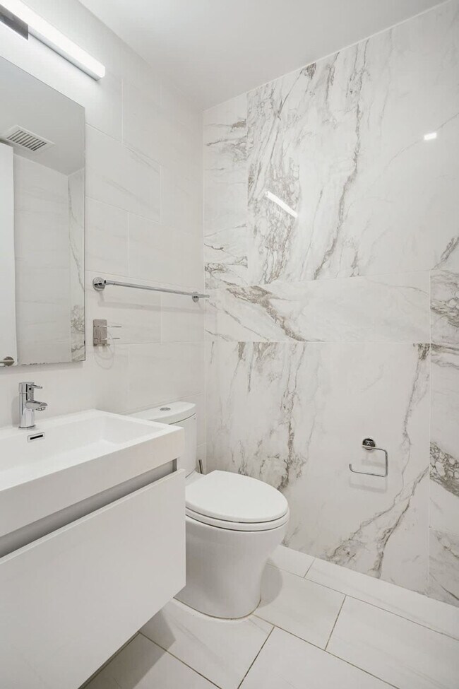 Photo - 132 W 26th St Unidad ID1335205P