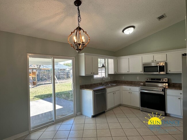 Photo - Charming 3-Bed Home in Milton’s Plantation Woods – Prime Location Near I-10 & Shopping