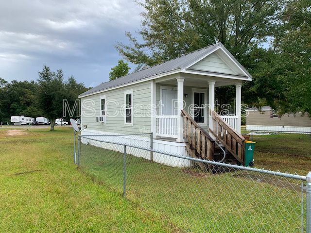 Building Photo - 8400 W Oaklawn Rd Unit 61