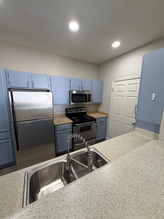Kitchen. new sink and faucet and disposal,additioal pantry added - 231 W Horizon Ridge Pky Unit 2311