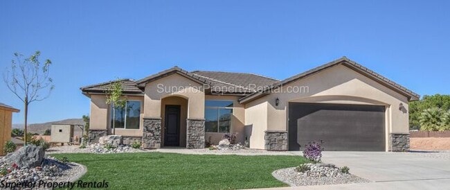 Building Photo - 4 bed, 2.5 bath home, 2 car garage with a large yard/ Pet friendly