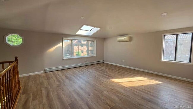 Building Photo - 206-66 46th Ave Unit 2/F