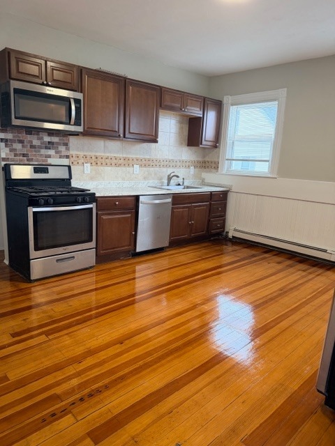 Building Photo - 1488 Hyde Park Ave Unit 2