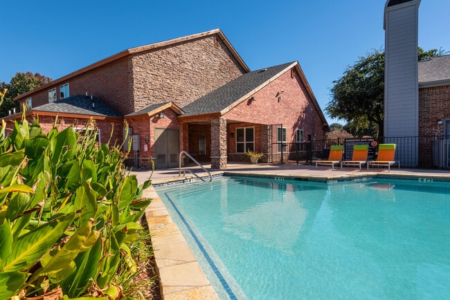 Relaxing Swimming Pool Area in Carrollton Apartment Complex - Greentree Rental
