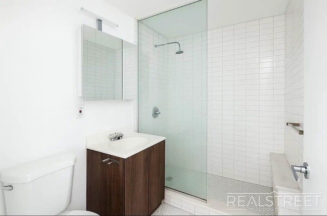 Photo - 2 Bed Home with large Living Space – Laundry, Roof Decks, Pet Friendly Unit 4A