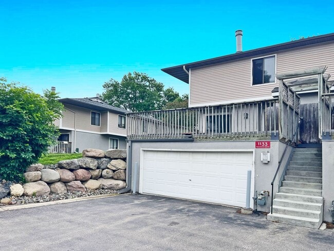 Photo - Spacious End-Unit Townhome with Fireplace, Family Room, 2-car Garage, Community Pool & Playground...
