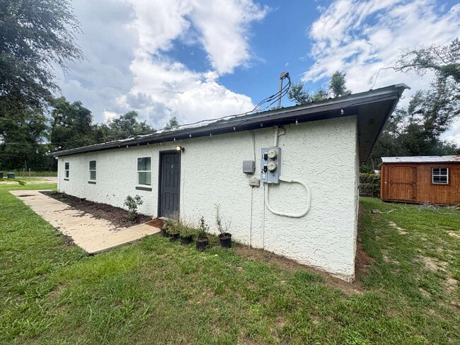 Photo - Open floor plan, four-bedroom two-bathroom with washer and dryer Unit 2