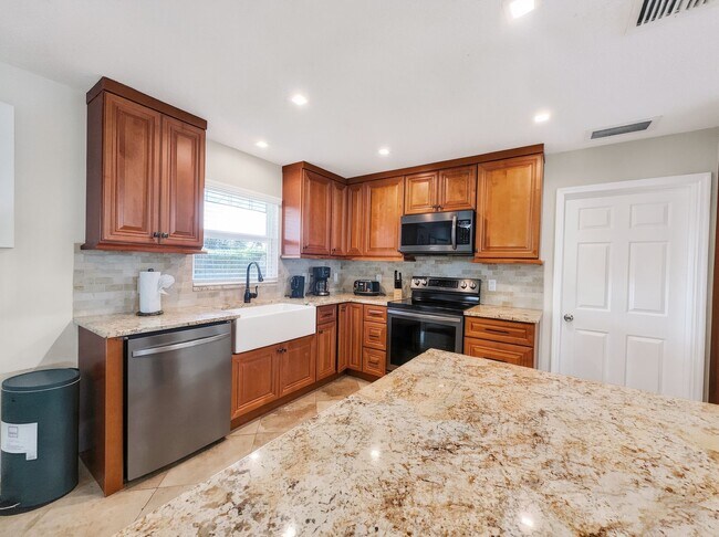 Photo - Discover the perfect Naples Park rental just minutes from the beach.