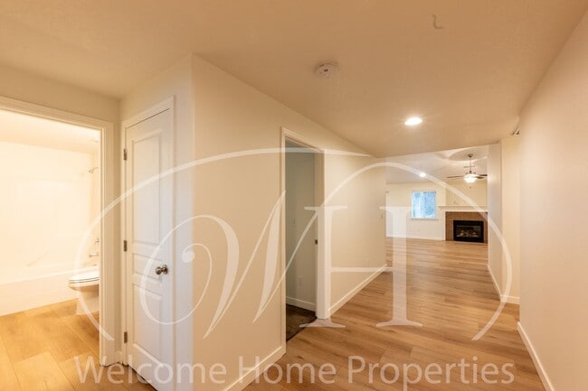 Photo - Single Story 3 Bedroom Home with Gas Fireplace and Covered Patio