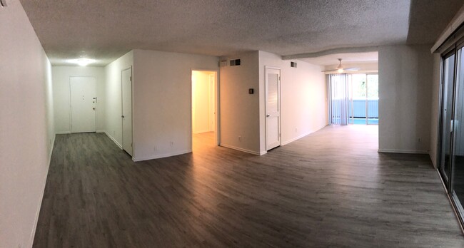 Living room towards South balcony - 4255 Duquesne Ave Apartment Unit 4255