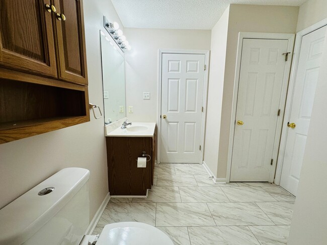 Photo - 2BR Condo with Garage | Vaulted Ceilings | Real Hardwood Floors | Gas Fireplace | Near UT & Downt...