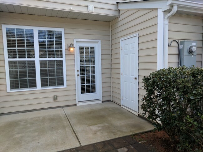 Back patio with storage - 205 Spring Gardens Drive Townhome