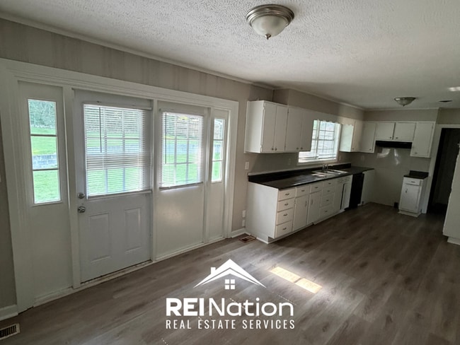 Photo - 3BR/2BA Center Point Rental with Hardwood Floors Throughout & Fenced Backyard