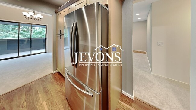 Photo - Top-floor 2-level condo with brand-new kit...