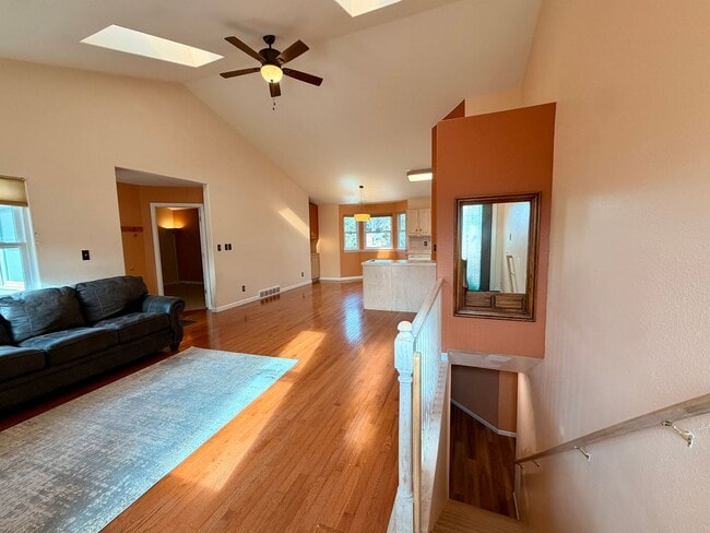 Photo - 5-Bed, 2.5-Bath Home Near MacIntosh Lake with Hardwood Floors, Gas Fireplace, and Finished Basement