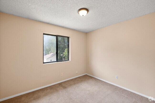 4BR, 2BA - 1,100SF - Primary Bedroom