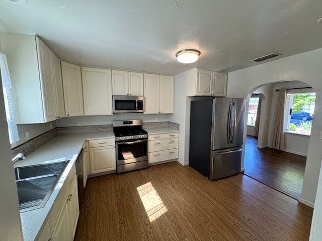 Photo - Charming Updated 4-Bedroom Home in the Gar...